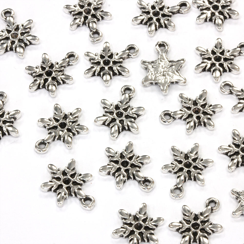 Tiny Snowflake Antique Silver 9x12mm - Pack of 50