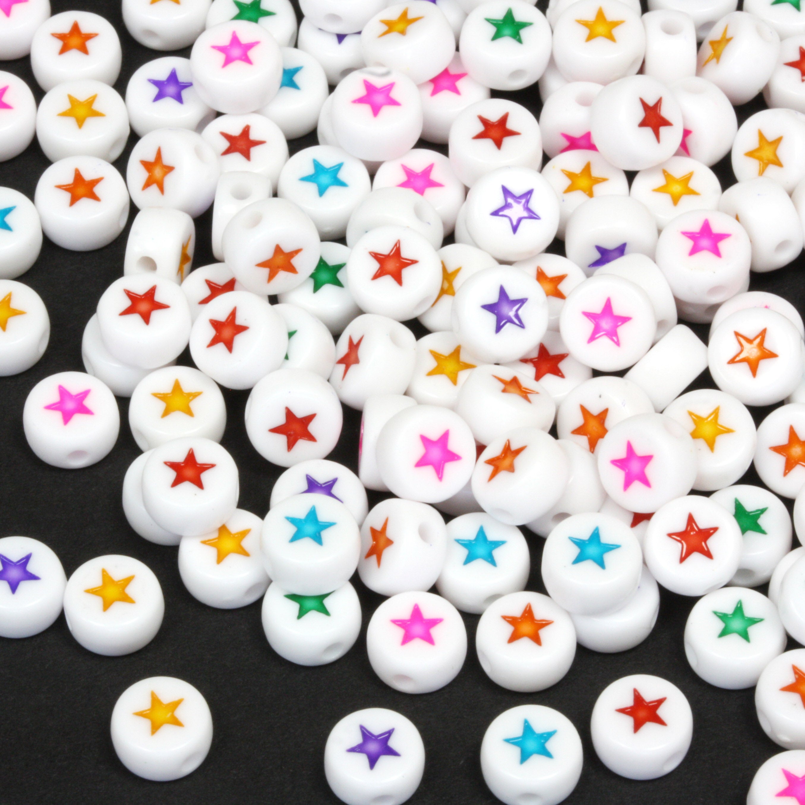 Coloured Stars on White 4x7mm Mix - Pack of 200