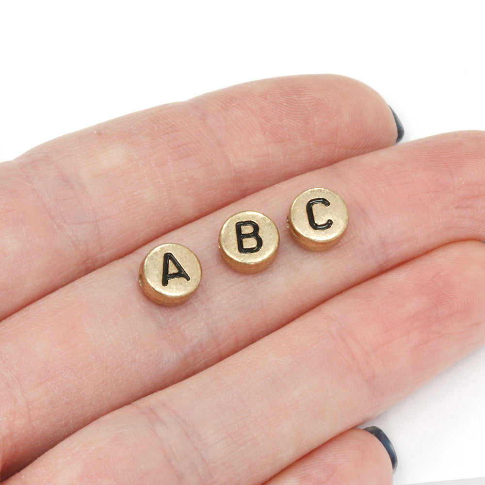 Black Letters on Rose Gold Rounds 4x7mm - Pack of 200