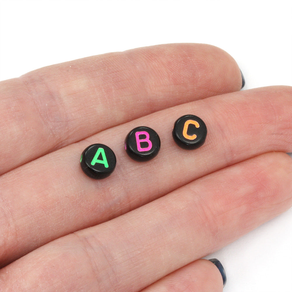 Coloured Letters on Black Rounds 4x7mm - Pack of 200