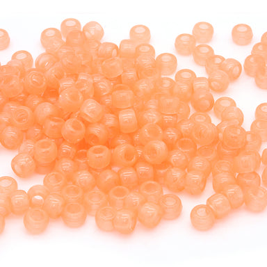 kids plastic glow in the dark orange coloured  pony beads with large holes