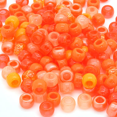 kids plastic mix of orange coloured  pony beads with large holes
