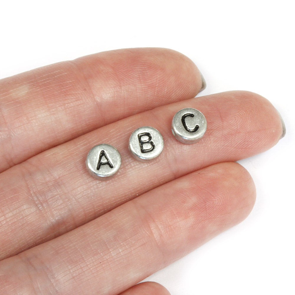 Black Letters on Silver 4x7mm - Pack of 200