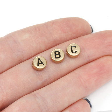 Flat round plastic letter rose gold mix of  alphabet beads