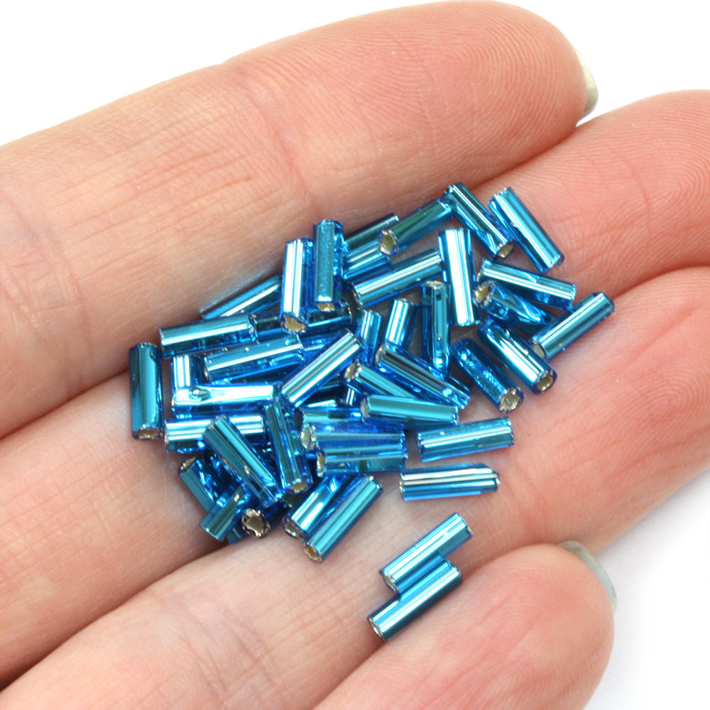 Turquoise 6.6mm Bugle Silver Lined - Pack of 50g